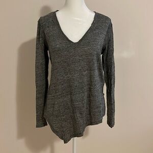 Linen long-sleeve top with asymmetrical hem and raw detailing